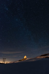 Scenic view of star field against sky at night