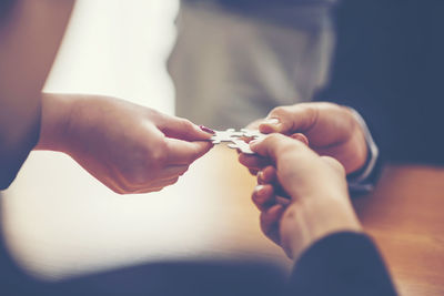 Close-up of hand holding hands