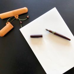 High angle view of pen on table