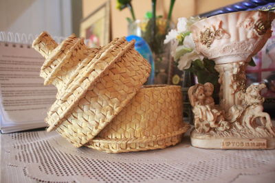 Close-up of sculpture in basket on table