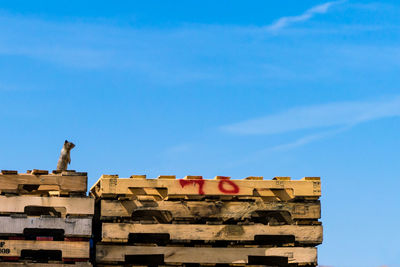 Low angle view of building against blue sky