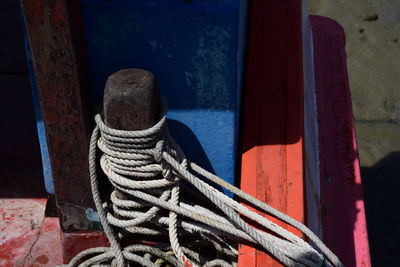 Close-up of rope tied on metal