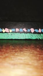 Close-up of multi colored pencils on table