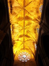 Low angle view of illuminated chandelier