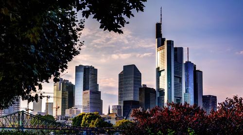 Low angle view of buildings against sky during sunset