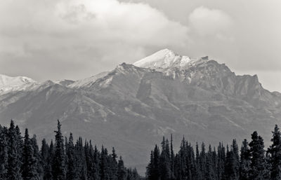 Scenic view of denali against cloudy sky at national park