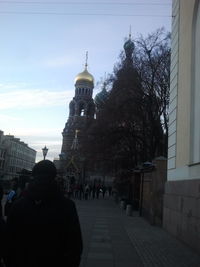 Tourists in front of building