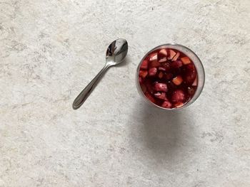 High angle view of strawberries in bowl on table