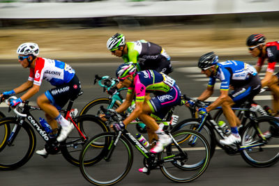 Men riding bicycles in competition