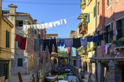 Alley amidst buildings in city