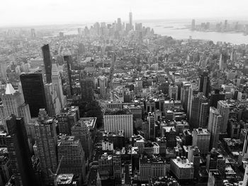 High angle view of modern buildings in city against sky