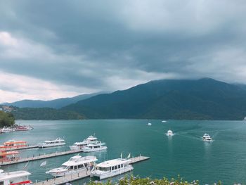 Scenic view of sea against cloudy sky