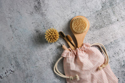 Natural brushes made of wood and soap on concrete
