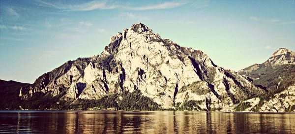 Scenic view of lake with mountains in background