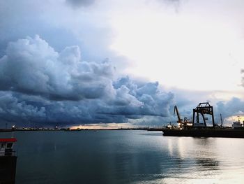 Pier over sea against sky