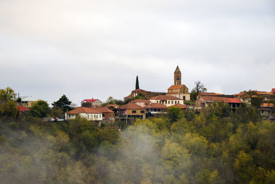 Sighnaghi village landscape and city view in kakheti, georgia. old houses beautiful view during mist 