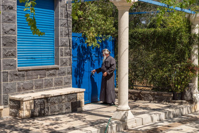 Man standing outside building