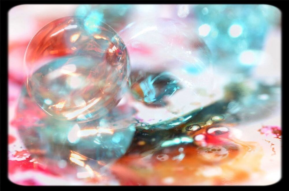 transfer print, water, auto post production filter, transparent, bubble, close-up, full frame, reflection, multi colored, indoors, backgrounds, glass - material, abstract, waterfront, pattern, refreshment, swimming pool, swimming, high angle view, underwater