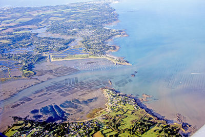 High angle view of rice and sea in city