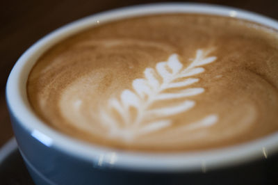 Close-up of cappuccino on table