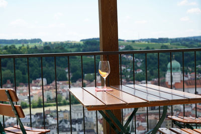 Close-up of glass on table by window