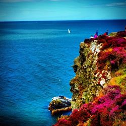 Scenic view of sea against blue sky