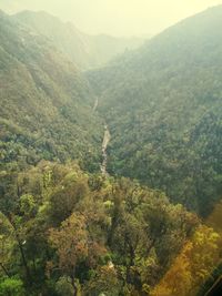 Scenic view of mountains during foggy weather