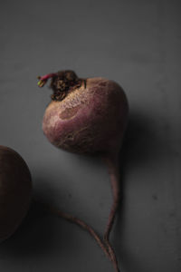 Close-up of fruit on table against white background