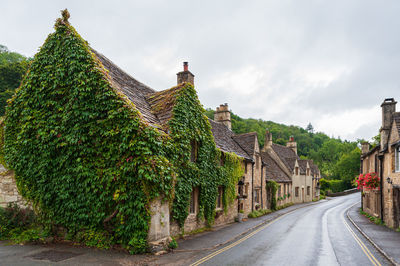 Castle combe, quaint village with well preserved stone houses dated back to 16 century in cotswolds.