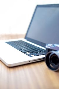 Close-up of laptop on table