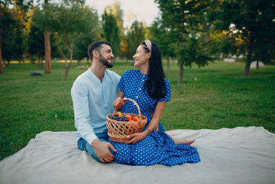 Young couple kissing in park