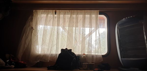 Clothes hanging on glass window of train