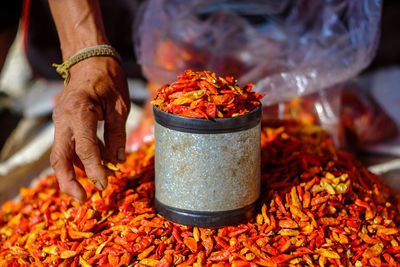 Midsection of man preparing food