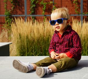 Boy playing with toy car