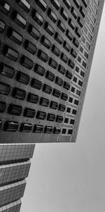 Low angle view of modern buildings against sky