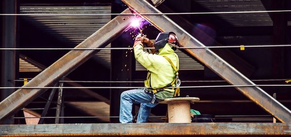 Manual worker welding