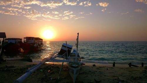 Scenic view of sea at sunset