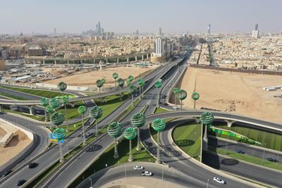 High angle view of highway in city against sky