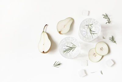 High angle view of fruits on white table