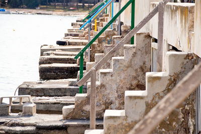 Row of metal railing and steps