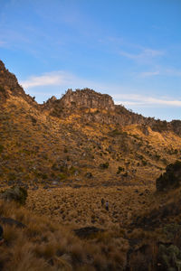 Scenic view of rocky mountains against sky