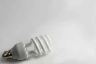 Close-up of bottle against white background