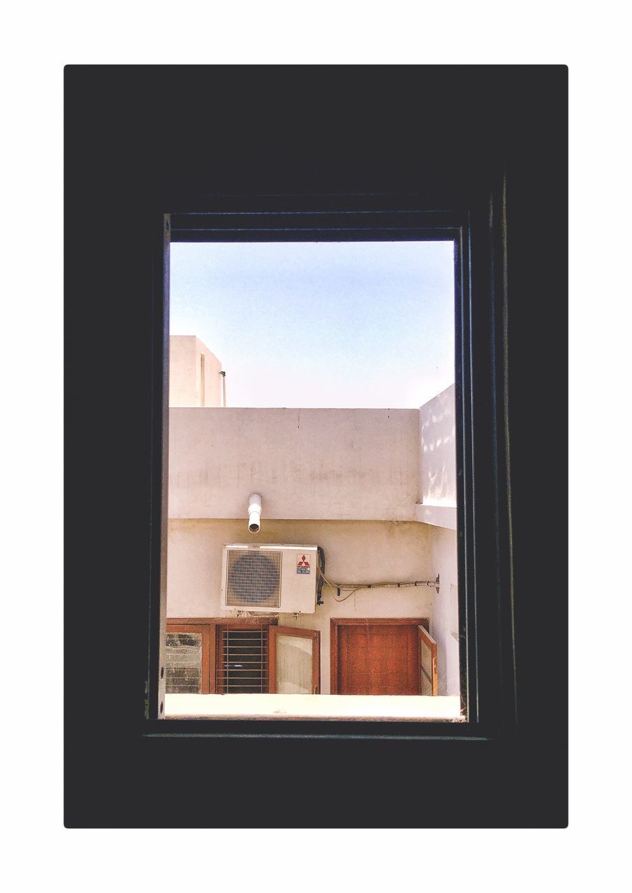 window, looking through window, day, no people, built structure, architecture, low angle view, indoors, sky