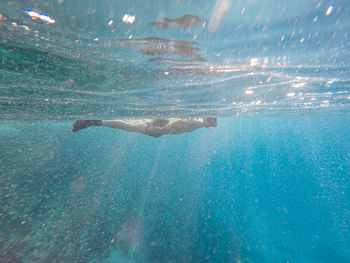 High angle view of swimming in sea