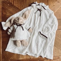 High angle view of garment with stuffed toy on floor