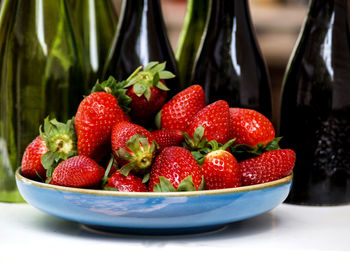 Close-up of strawberries in bowl on table