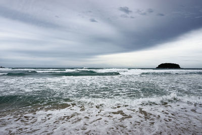 Scenic view of beach against sky