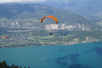 Paragliding over sea and mountains