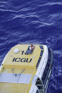 High angle view of text on sea