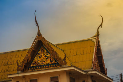 Low angle view of traditional building against sky